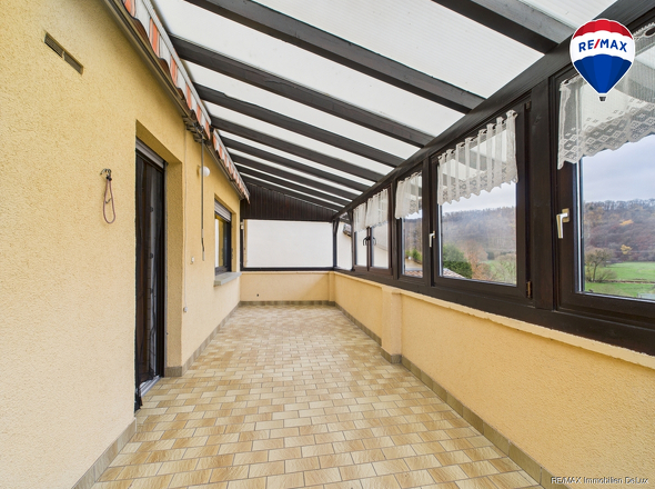 RE/MAX Immobilien DeLux Zweifamilienhaus Wadern-Lockweiler Wintergarten