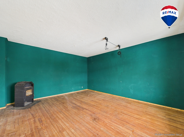 RE/MAX Immobilien DeLux Haus verkauf Fitten