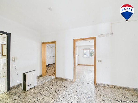 RE/MAX Immobilien DeLux Haus verkauf Fitten