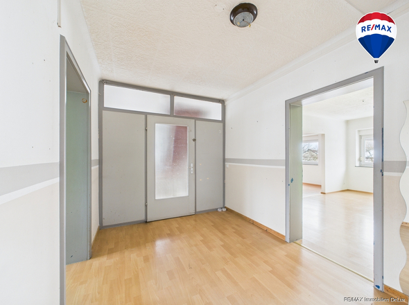 RE/MAX Immobilien DeLux Haus verkauf Fitten