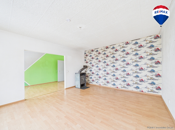 RE/MAX Immobilien DeLux Haus verkauf Fitten