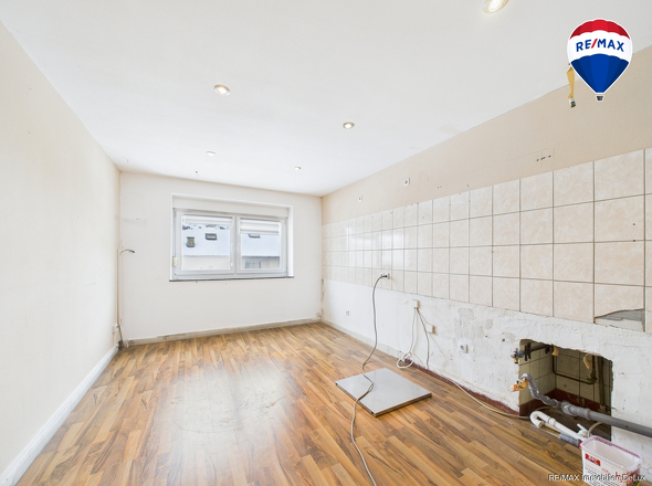 RE/MAX Immobilien DeLux Haus verkauf Fitten