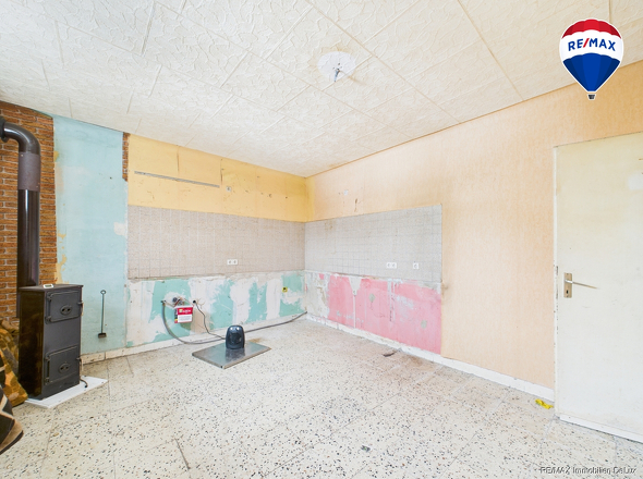 RE/MAX Immobilien DeLux Haus verkauf Fitten