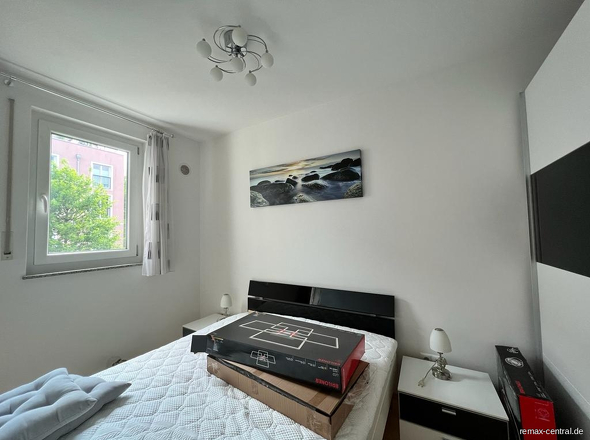 Schlafbereich hinter Wohnwand