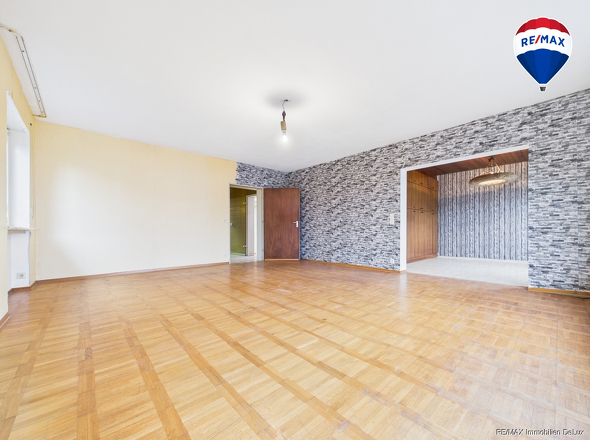 REMAX Immobilien DeLux Einfamilienhau Wohnzimmer Eppelborn Mark Borowicz