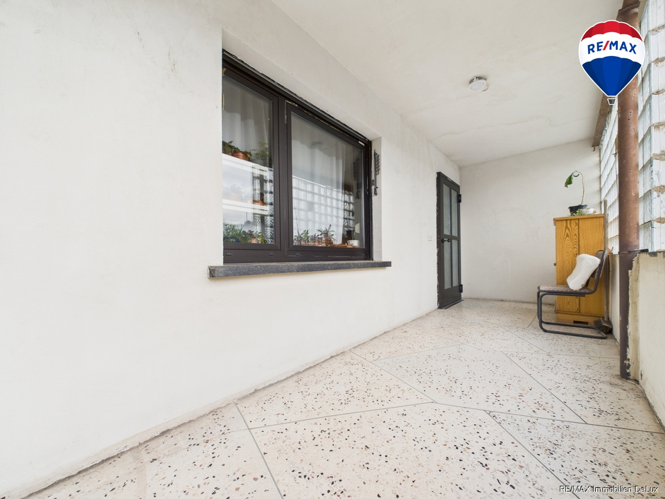REMAX Immobilien DeLux Einfamilienhaus EIngang Schmelz Mark Borowicz