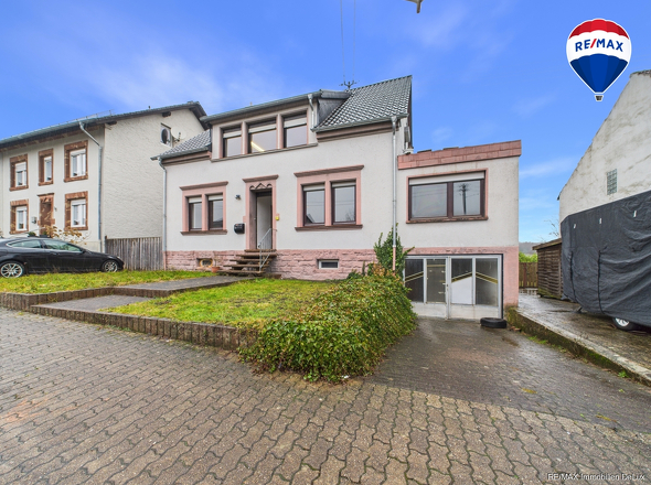 REMAX Immobilien DeLux Haus in Weiskirchen - Rappweiler zu verkaufen