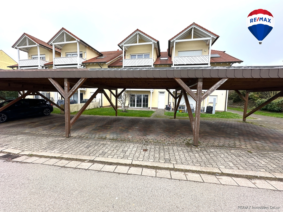 Erdgeschoss Wohnung in Besch mit Terrasse & Carport zu verkaufen 