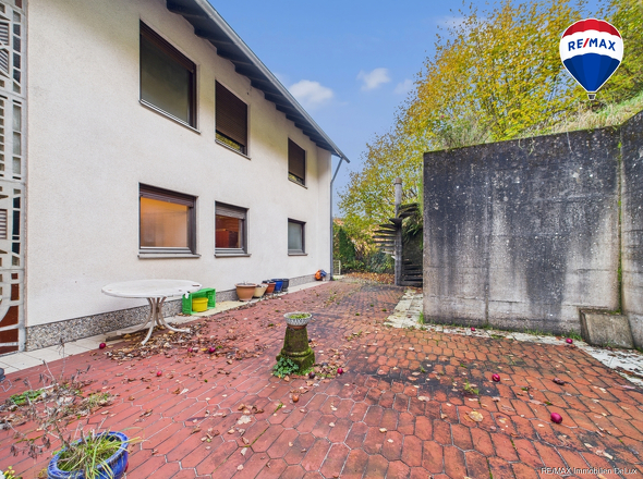 RE/MAX Immobilien DeLux Wohn-Geschäftshaus Merzig 