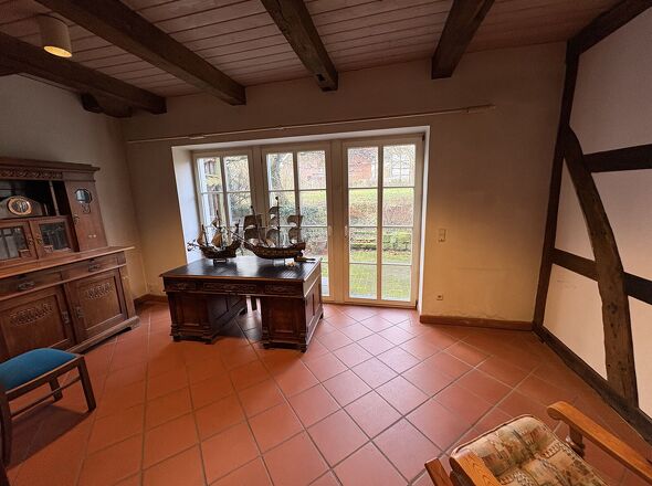 Wohnzimmer mit Zugang Terrasse