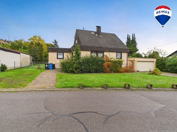 RE/MAX Immobilien DeLux Einfamilienhaus Wallerfangen-Oberlimberg Front