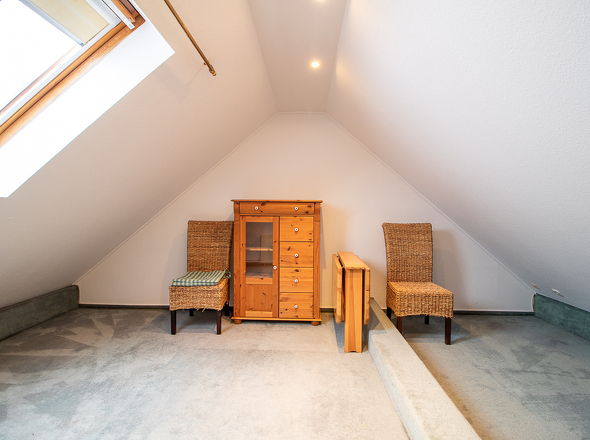 Obergeschoss: wohnraumähnlich genutztes Zimmer