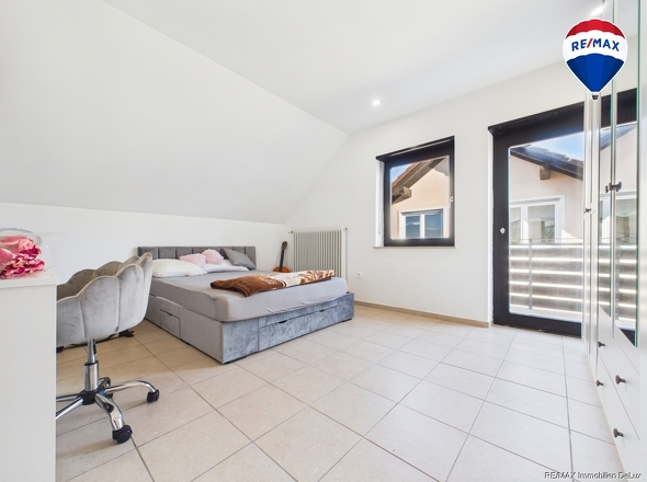 REMAX Immobilien DeLux Einfamilienhaus Schlafzimmer Saarlouis Mark Borowicz