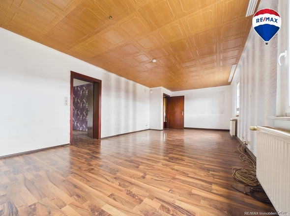 REMAX Immobilien DeLux Mehrfamilienhaus Wohn-/Esszimmer Saarbrücken Mark Borowicz