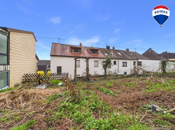 REMAX Immobilien DeLux Mehrfamilienhaus Rückansicht Saarbrücken Mark Borowicz