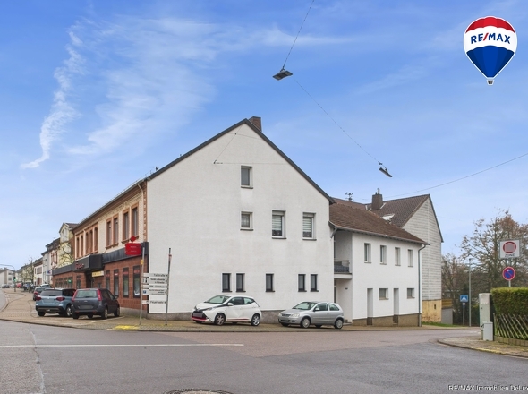 REMAX Immobilien DeLux Eigentumswohnung Seitenansicht Schwalbach Mark Borowicz