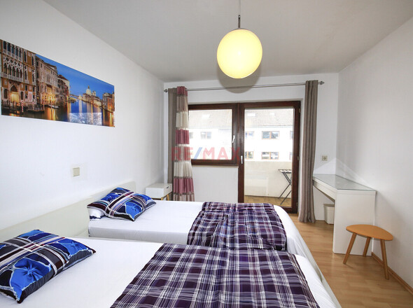 Schlafzimmer mit Balkon