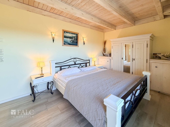 Schlafzimmer mit Balkonzugang