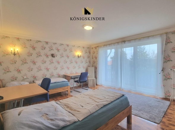 Schlafzimmer 1.OG mit Balkonzugang