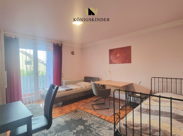 2. Schlafzimmer mit Balkonzugang 1.OG