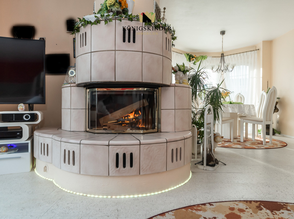 und im Mittelpunkt ein Kaminofen...