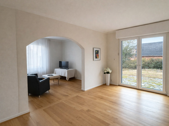 Wohnbereich mit Zugang zum Garten