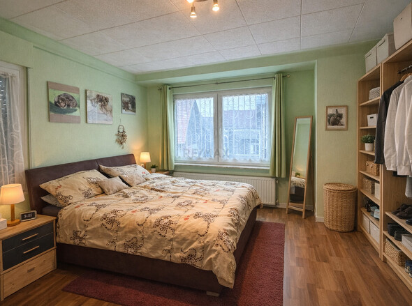 OG Elternschlafzimmer mit KI entpersonalisiert