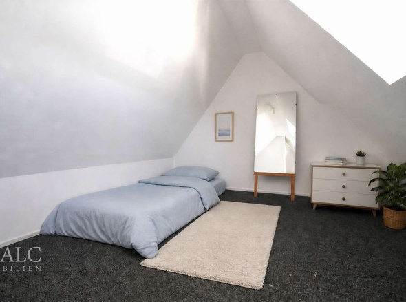 ... das Schlafzimmer im Dachgeschoss