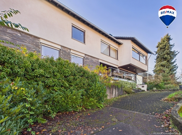 RE/MAX Immobilien DeLux Wohn-Geschäftshaus Merzig 