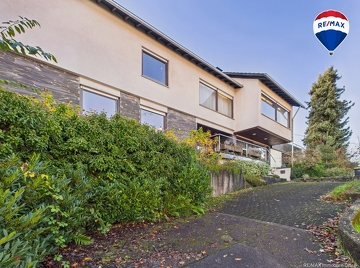 RE/MAX Immobilien DeLux Wohn-Geschäftshaus Merzig 