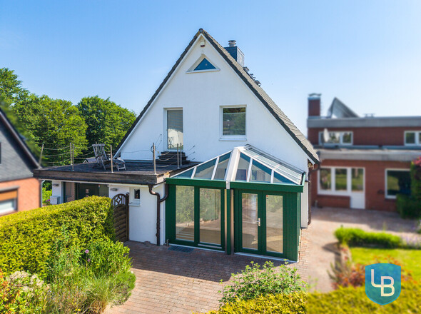 Blick auf den Wintergarten und die Dachterrasse