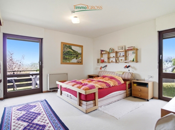 EG - Elternschlafzimmer, ebenfalls mit Zugang zum Balkon
