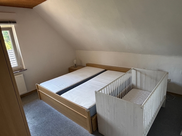 OG ein Schlafzimmer