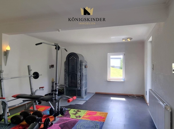 ehemaliges Wohnzimmer mit Holzofen