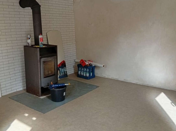 Wohnzimmer mit Kamin