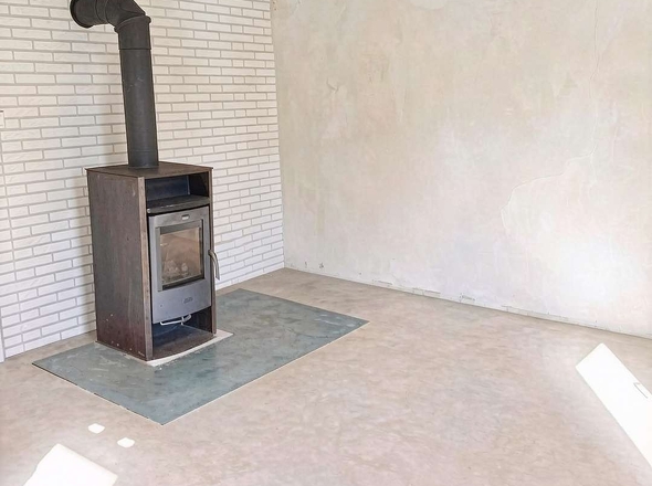 Wohnzimmer mit Kamin