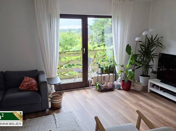 Wohnzimmer mit Balkon EG