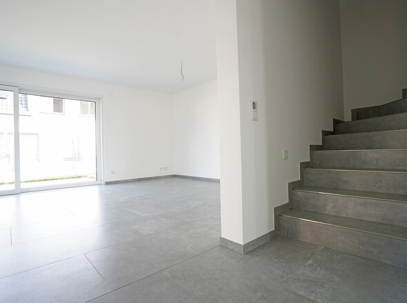 Treppenhaus und Wohnbereich