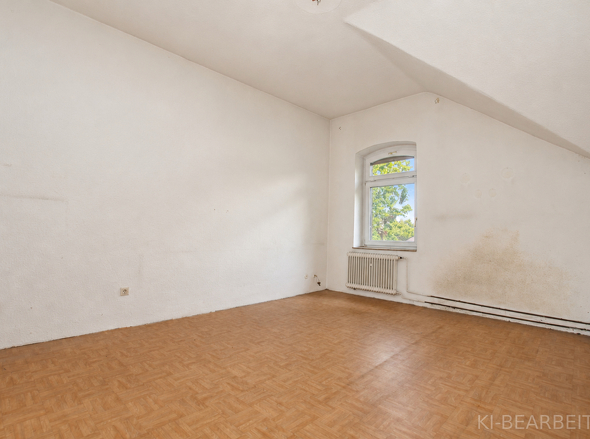 Schlafzimmer im Dachgeschoss – Ansicht 1