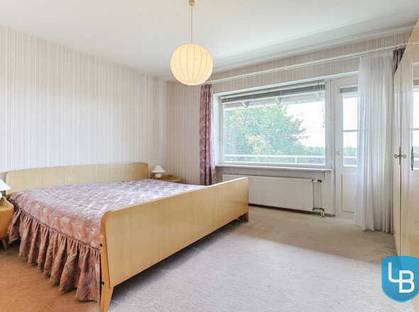 Schlafzimmer EG mit Zugang zum Balkon